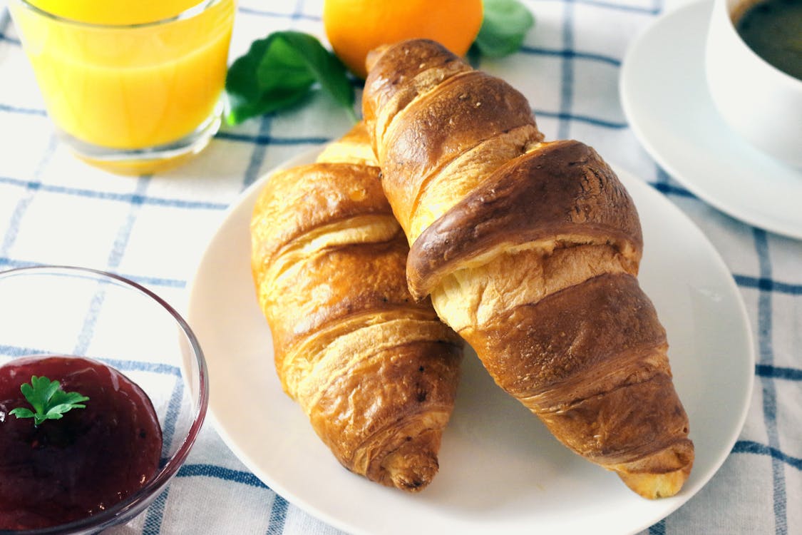 A photo showcasing two croissants